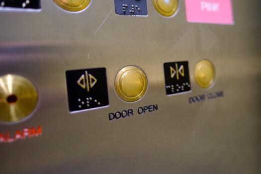 The open elevator door button puts kindness at our fingertips